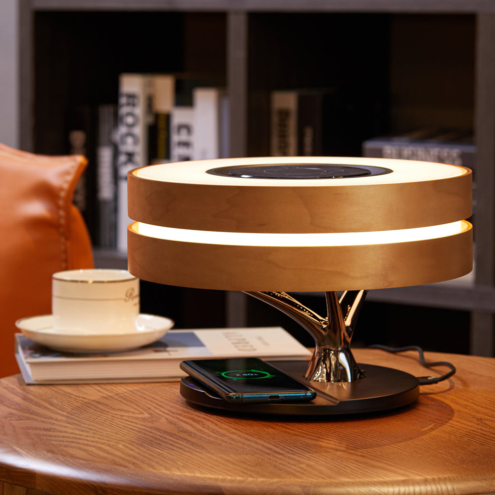 La lámpara de mesa Serie Moderna con altavoz y cargador inalámbrico