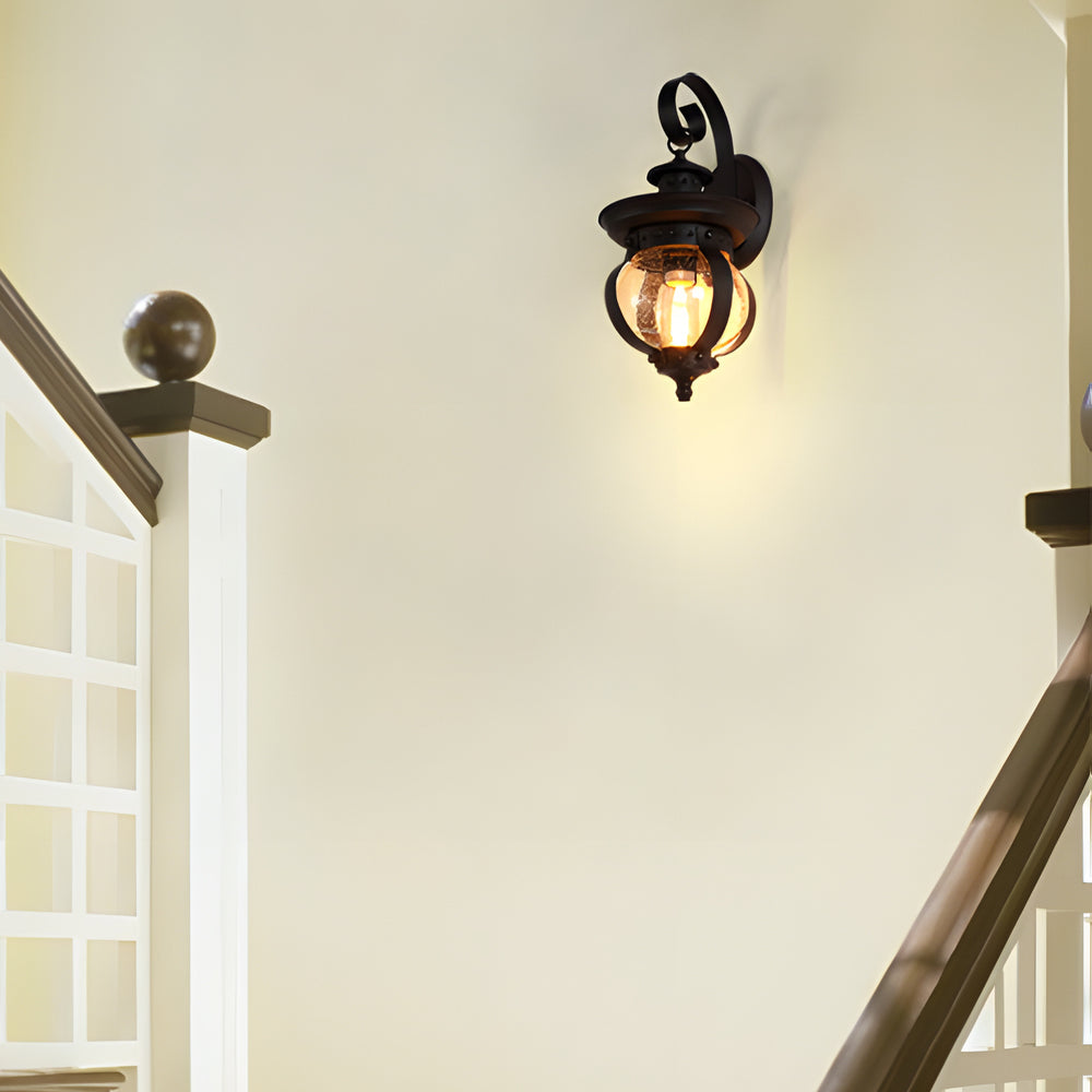 Lámpara de pared exterior LED de 1 luz con brazo curvado