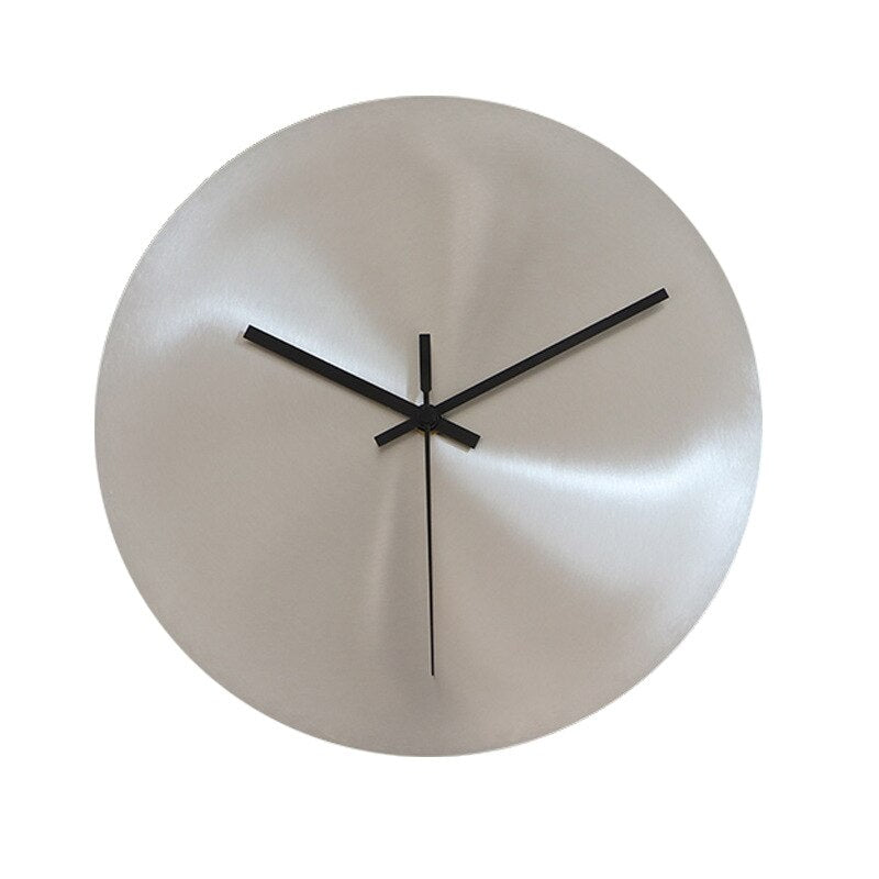 Reloj de pared minimalista de acero inoxidable