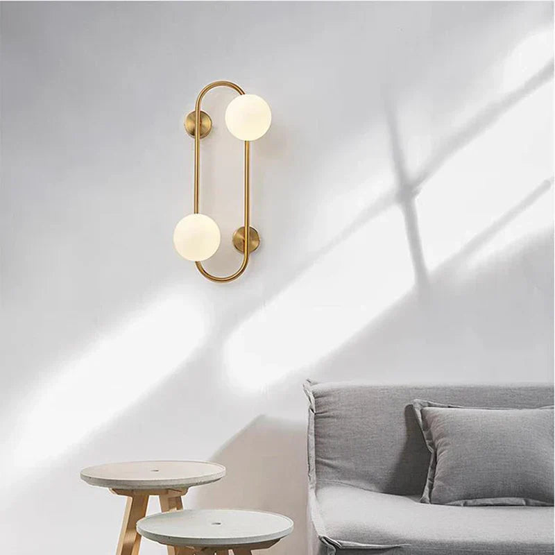 LuminoSphere - Lámpara de pared moderna de latón con esferas de vidrio