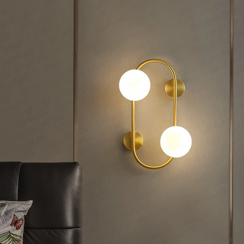 LuminoSphere - Lámpara de pared moderna de latón con esferas de vidrio