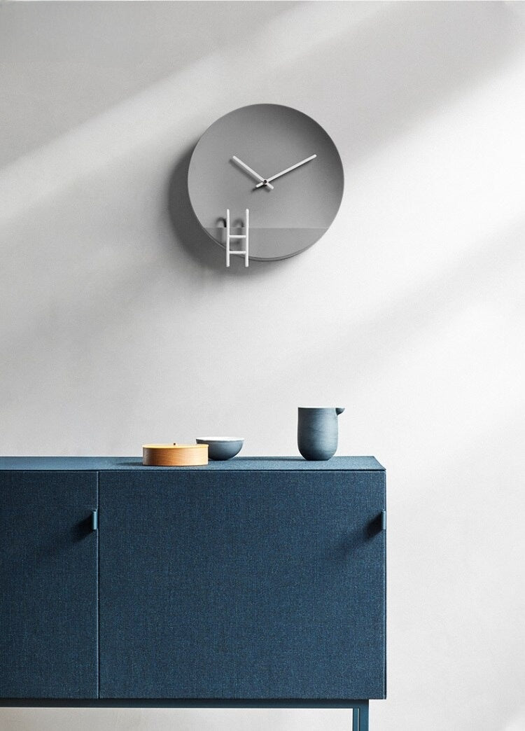 Reloj de pared moderno de cemento gris