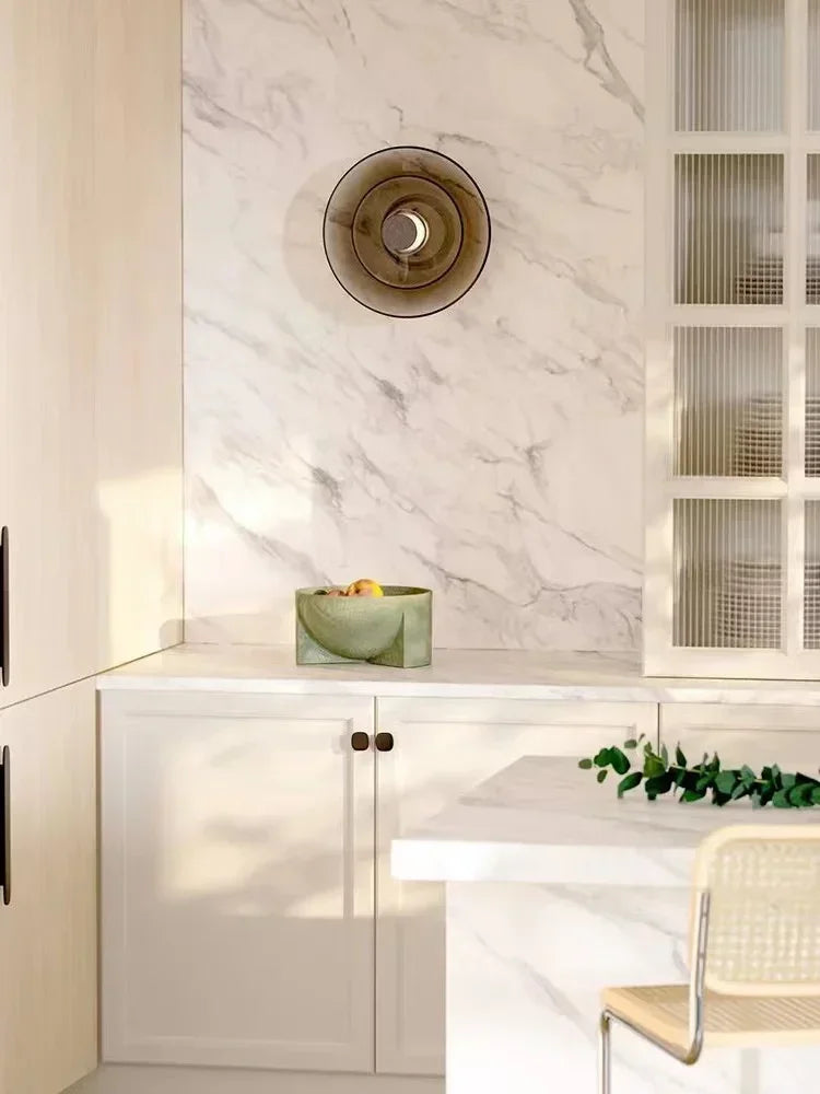 LumiDisc – Amber glazen wandlamp voor een warme sfeer